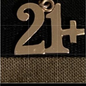 Vintage 80s  21+ charm in gold tone